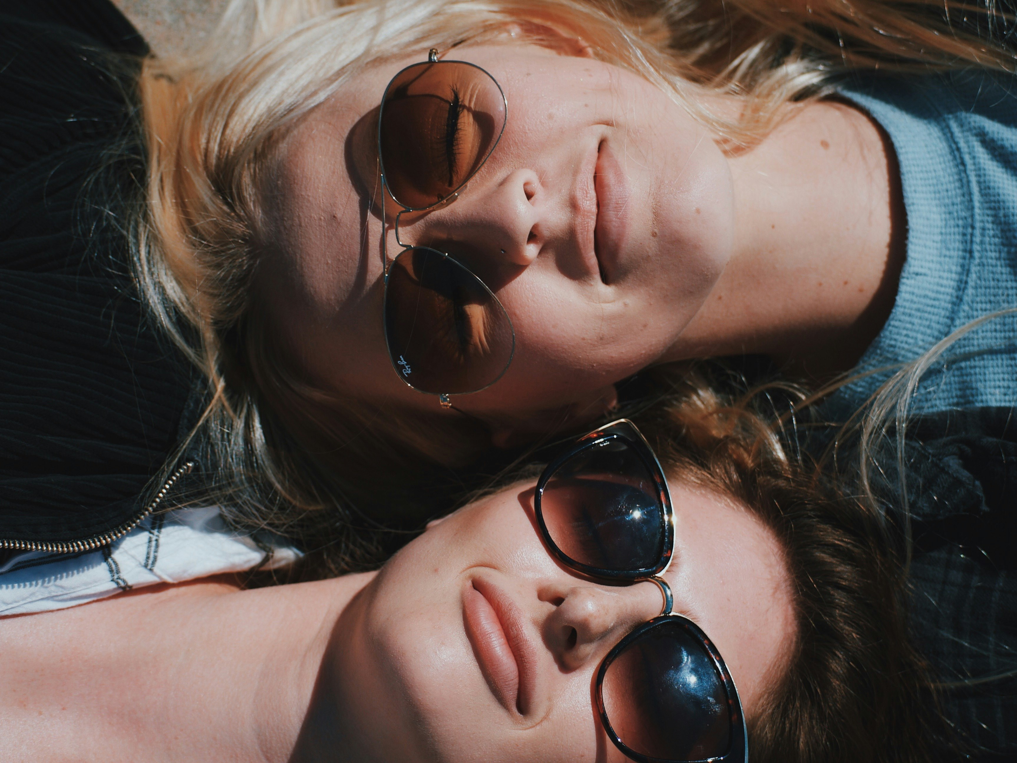 two woman on focus photography